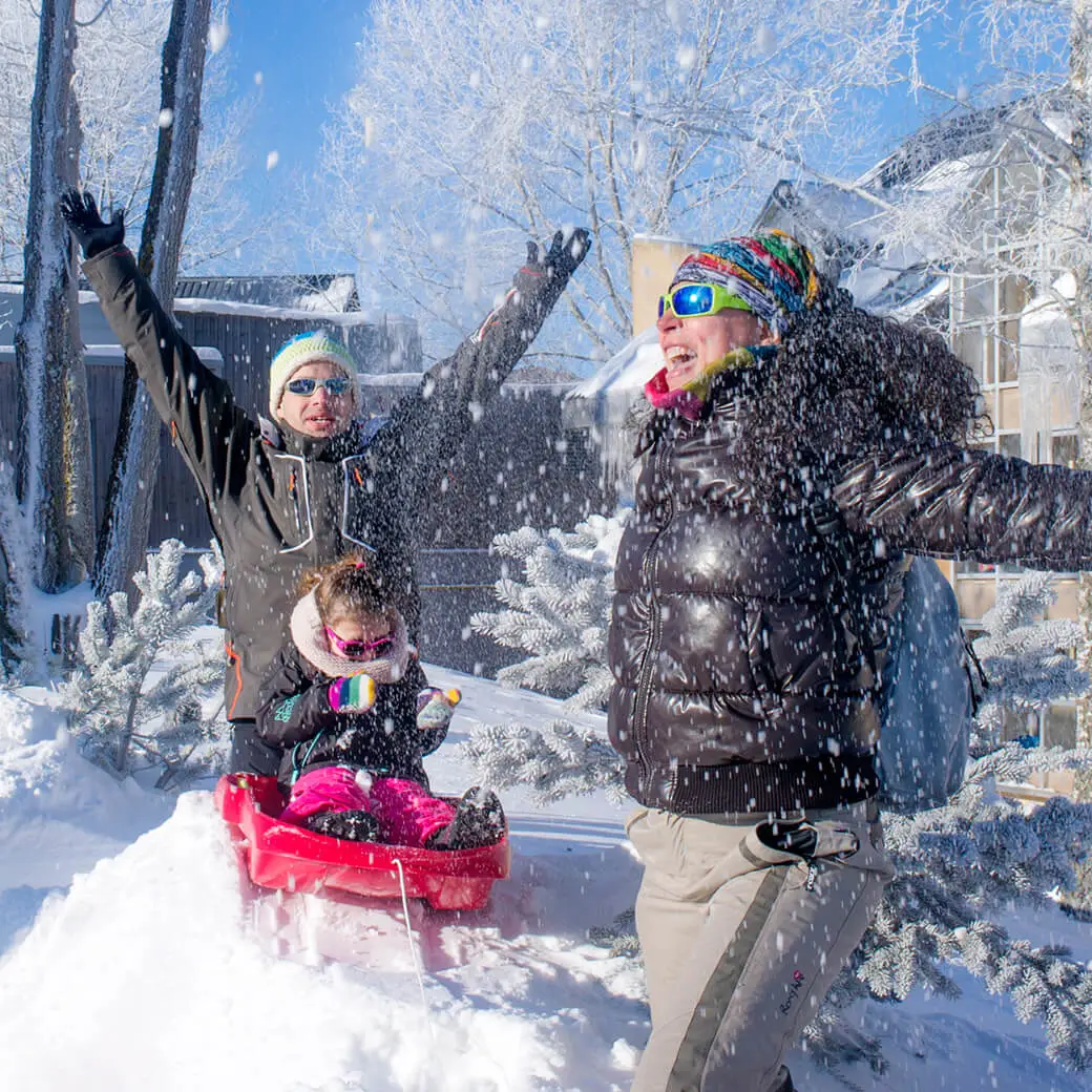 Vacances famille luge en hiver à métabief